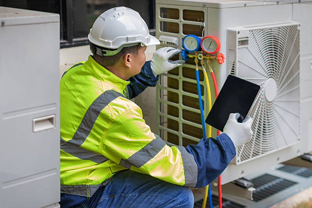 Professional Air Conditioning Repair technician working in Palmyra, IN